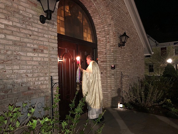 Fr Sergei knocking on the closed doors to enter