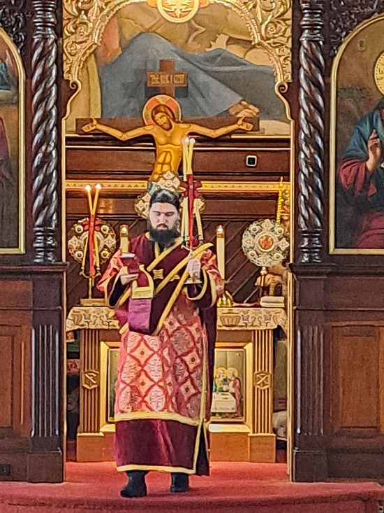 Deacon Eugene Shkurti, a seminarian from the Albanian Archdiocese who is studying at St. Vladimir's Seminary, serving during the Divine Liturgy