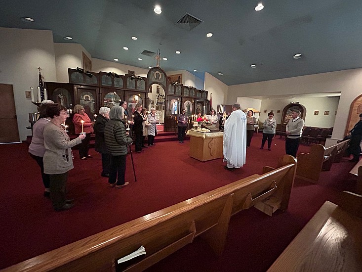 The Teuta Ladies Society standing in vigil during prayers after Divine Liturgy